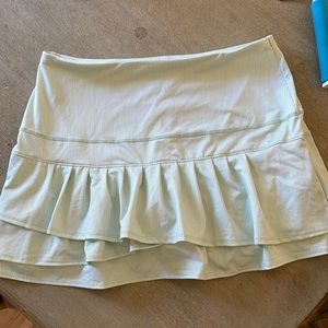 Lucky In Love tennis skirt with green and white stripes